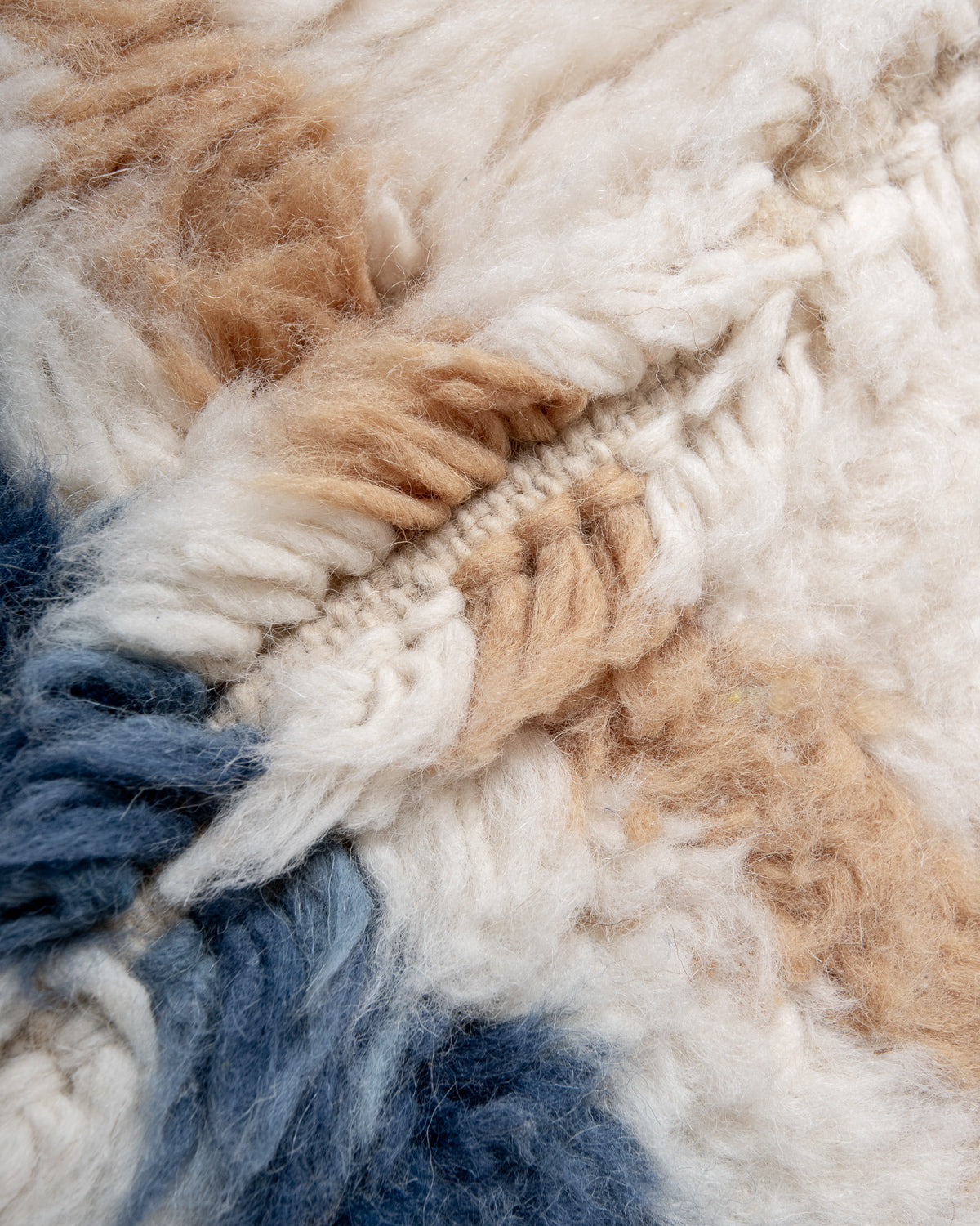 Modern, designer, handcrafted Berber rug from Morocco. Beniourain carpet with beautiful colours and patterns and fluffy wool texture.